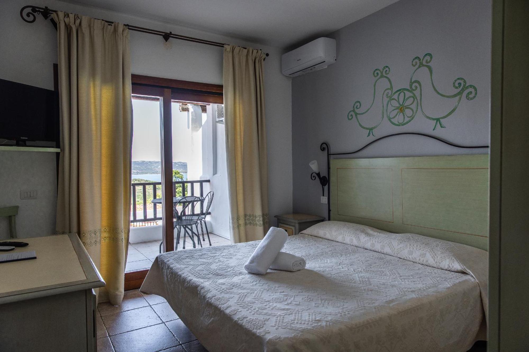 Hotel Pedra Santa Baja Sardinia Eksteriør bilde